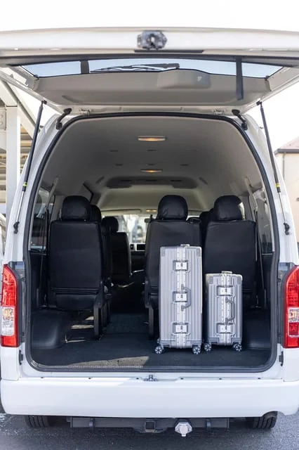 Haneda to hotel private car service Japan — licensed Toyota Alphard at HND Airport transfer bay