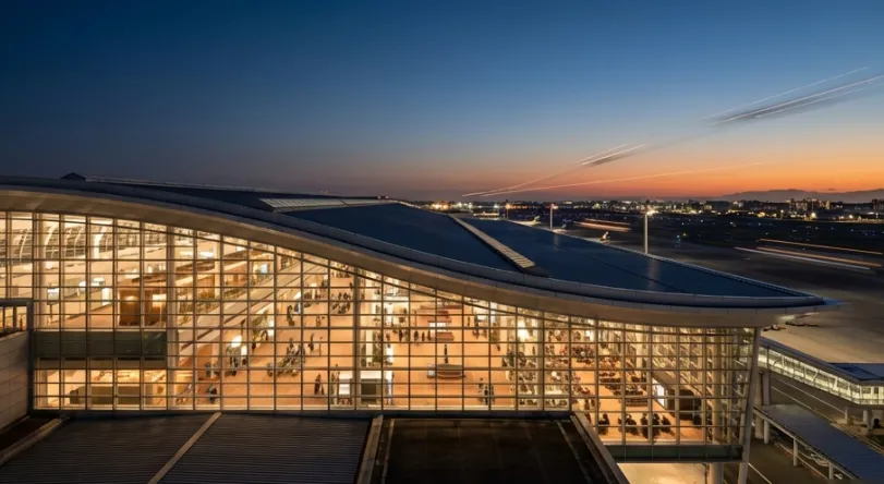 Haneda Airport Tokyo illuminated at night showing international terminal and runway